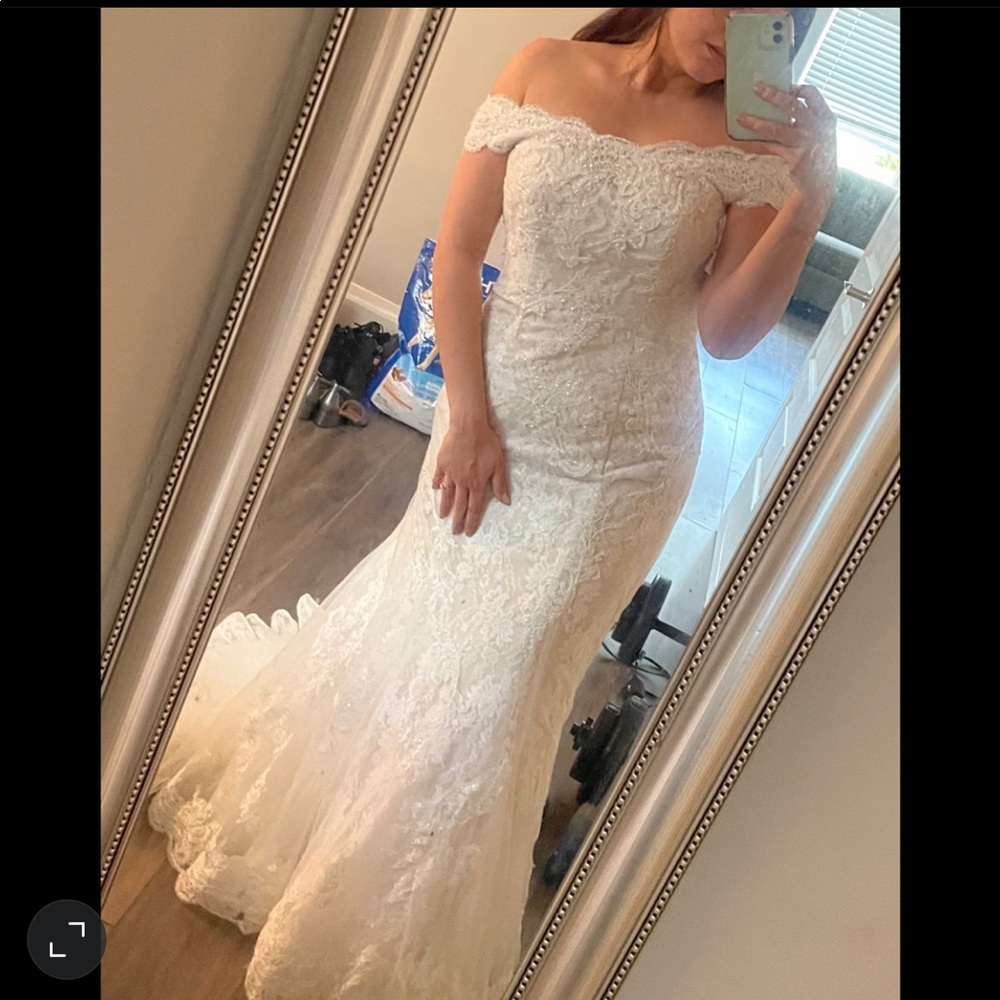 Off the shoulder Oleg Cassini dress.